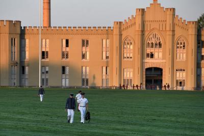 Students walk across parade ground at VMI, a military college in Virginia.