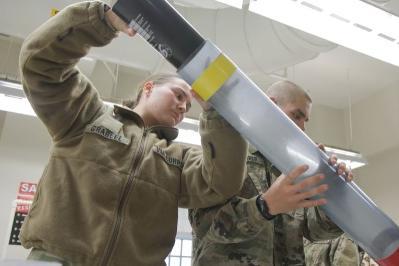 Cadets at VMI, a military college, participate in an experient during a civil engineering class.