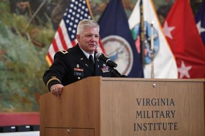 Chaplain Phillips speaks at podium at VMI, a military college in Virginia.