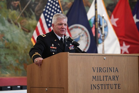 Chaplain Phillips speaks at podium at VMI, a military college in Virginia.