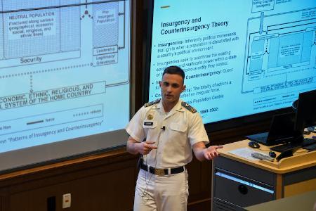 Student giving honors presentation at VMI, a military college in Virginia