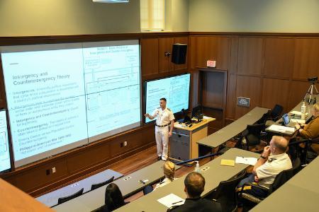 Student giving honors presentation at VMI, a military college in Virginia
