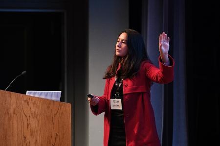 Erika Cheung, who is famously known for being a key whistle-blower reporting the medical-diagnostic company Theranos to health regulators, addressed conference participants in Gillis Theater.-VMI Photo by H. Lockwood McLaughlin.