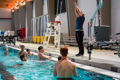 Students at a swim class at VMI, a military college in Virginia