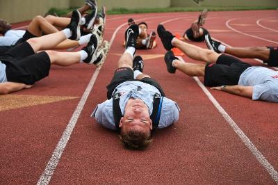 Summer Transition Program participants participate in physical training on the VMI track.