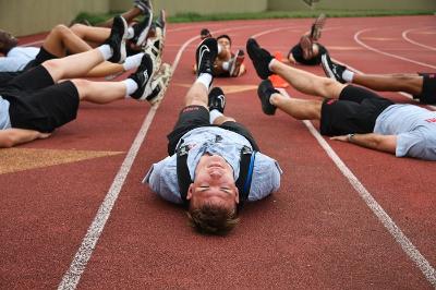 Summer Transition Program participants participate in physical training on the VMI track.