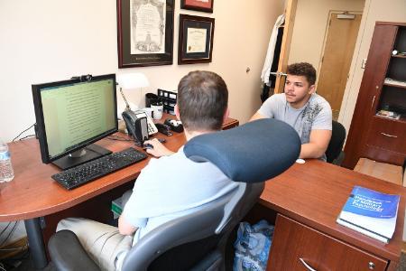 A student with a professor doing research at VMI, a military college in Virginia