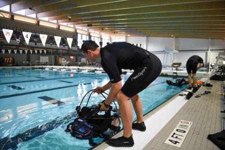 Student in the swimming pool for Scuba Club at VMI, a military school in Virginia