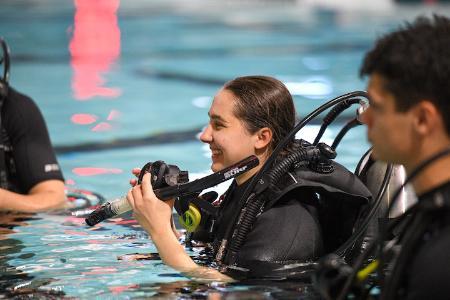 Student in the swimming pool for Scuba Club at VMI, a military school in Virginia