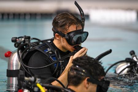 Student in the swimming pool for Scuba Club at VMI, a military school in Virginia