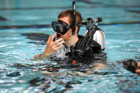 Student in the swimming pool for Scuba Club at VMI, a military school in Virginia