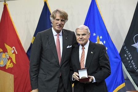 Gen. Peay receives the New Market Medal from the BOV president.