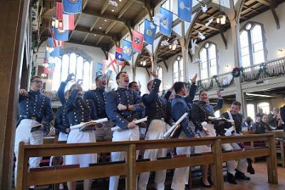 VMI cadets throw their gloves in celebration of their graduation from the oldest state-sponsored military college in the country.