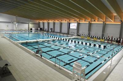 The 50-meter pool holds 800,000 gallons of water, and is large enough to be divided into three sections, making diving, water polo, and competitive swimming possible simultaneously. -VMI Photo by Kelly Nye.