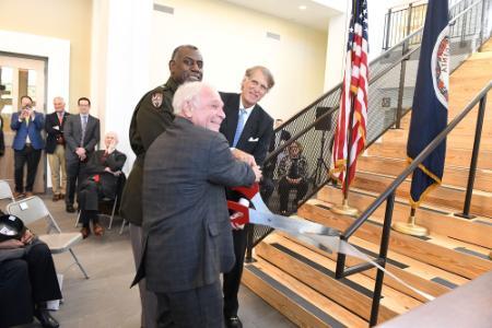 Thomas H. Zarges ’70, Alumni Agencies Board of Directors chairman; Maj. Gen. Cedric T. Wins ’85, superintendent; and Thomas “Tom” Watjen ’76, Board of Visitors president cut a ribbon