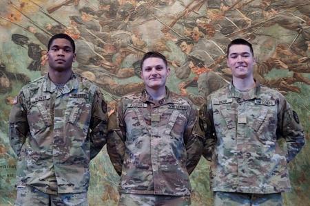 The 4th Class president, vice president, and historian pose for a photo in Memorial Hall after their election.