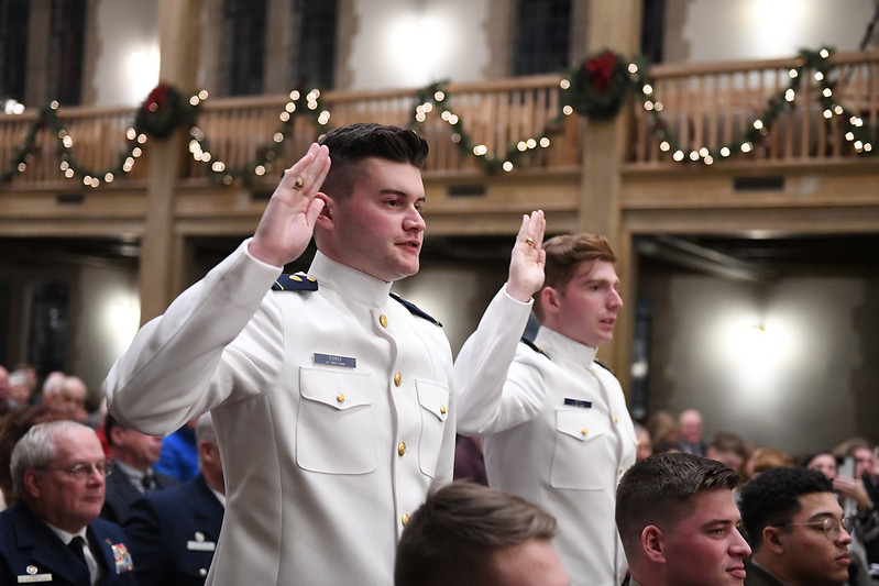 Two VMI May graduates return to Memorial Hall to take their oath and commission into the United States Coast Guard.