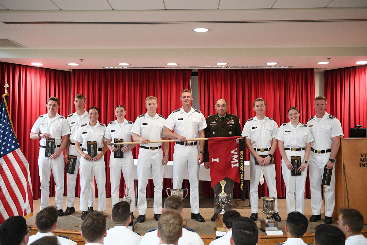 Company I poses with Col. Adrian T. Bogart III ’81, commandant of the Corps of Cadets, after receiving their North Post Challenge award.