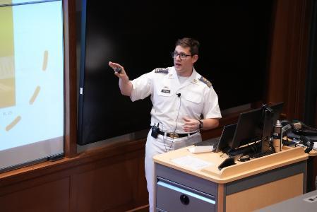 Adam Hoffman '24 presents his senior thesis on VMI recruitment during Honors Week.