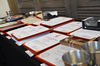 Awards are set up on a table in Memorial Hall ready to be handed out to cadets, faculty, and staff at VMI during May Graduation Week ceremonies.