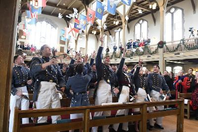 VMI graduates toss their gloves in a tradition that concludes the commencement ceremony and their time in the Corps of Cadets at the military college.