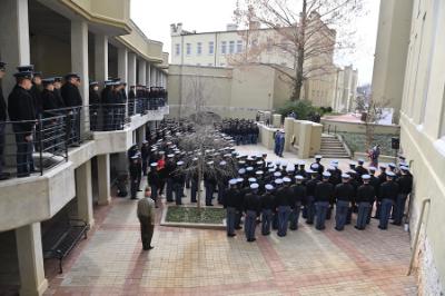 Cadets stand at attention as Alden Rhodes ’26 plays “Amazing Grace” on bagpipe following the laying of the wreath in Daniels Courtyard.