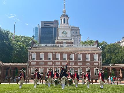 The Plymouth Fife and Drum Corps performs in front of Independence Hall.