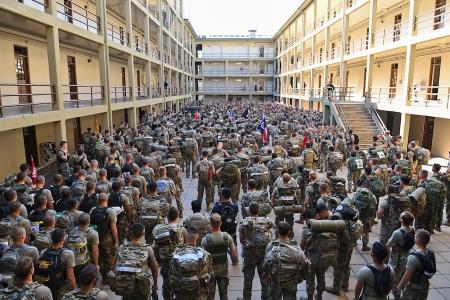 Cadets gather in New Barracks for speeches and a moment of silence before the stair climb.