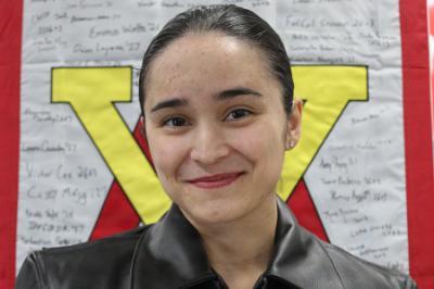 Midshipman 1st Class Nicole Samella, from Virginia Beach, Virginia, and a senior at Virginia Military Institute, poses for a photo after selecting USS Delbert D. Black (DDG 119) as her first ship assignment during the Naval Reserve Officers' Training Corps (NROTC) biannual ship selection ceremony hosted by Navy Personnel Command (PERS-41) Surface Warfare Officer Assignments, Feb. 25.