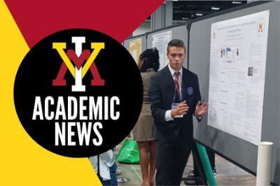 Charles McLaughlin ’26 discusses his research to an academic peer at the American Chemical Society’s fall conference at the Washington Convention Center in August.