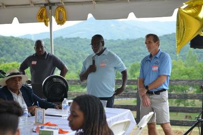 Eugene Williams ’74 speaks at reunion picnic in Collierstown July 11.