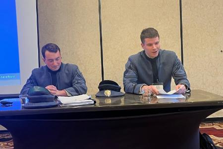 Aleck Tiller ’27 listens as John Paul Adams ’27 discusses his research at the Southern Humanities Conference Feb. 6.