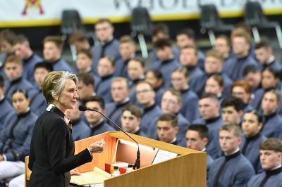 Guest speaker Carly Fiorina stands in front of VMI cadets during her speech.