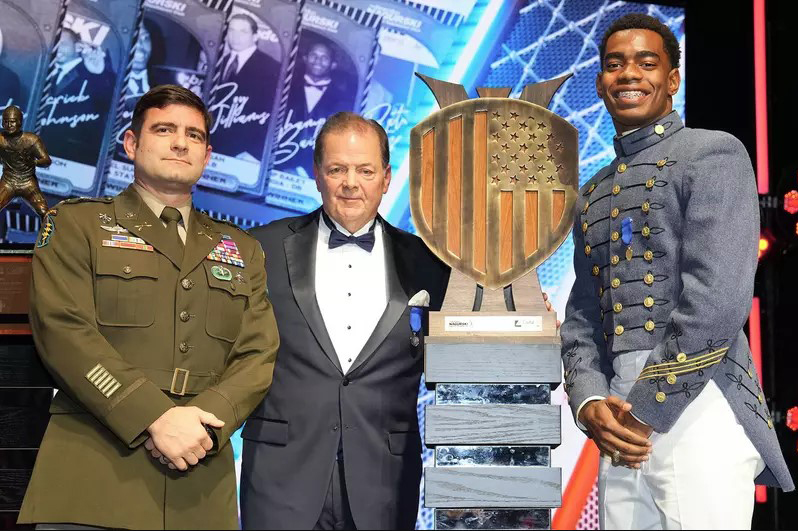 Cadet Kouri Crump poses with the Defender of the Nation Award.