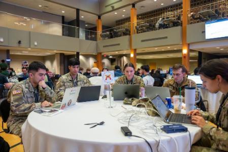 VMI cadets work together to decipher problems across a range of categories during the capture-the-flag competition in the Hall of Valor.