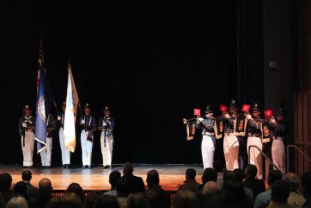 The Corps of Cadets color guard posts the colors as the herald trumpets play “The Star Spangled Banner” in Gillis Theater.