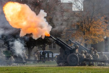 The Cadet Battery fires the howitzers during the Founders Day parade.