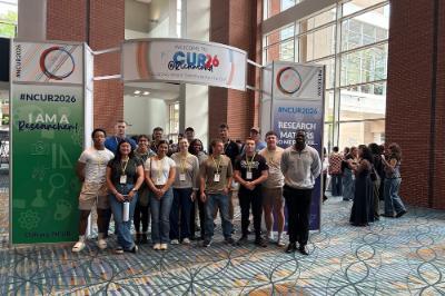 Cadets gather in the Greater Richmond Convention Center lobby before the start of NCUR.