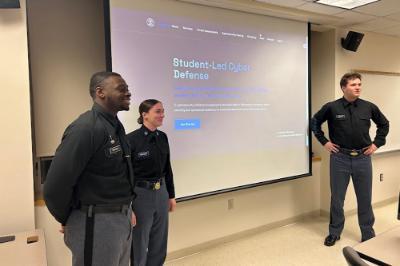 James Bangura ’26, Katelyn Redlinger ’27, and Gunnar Romsland ’26 review their cyber defense presentation for nonprofits and small local organizations in Rockbridge County.