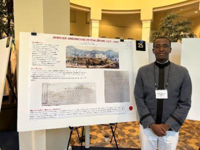 Jeremiah Woods ’27 presents his research project at SURF.