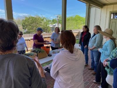 Rockbridge Area Master Gardeners demonstrate how to prepare soil for successful planting at the Jackson House Museum.