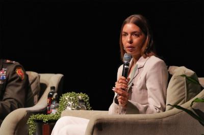 Moran Stella Yanai speaks from the stage.