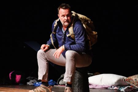 Scott Mann performs his one-man, one-act play, “11 Days: The Story of Operation Pineapple Express,” in Gillis Theater.