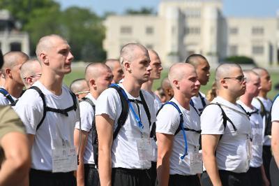 Andrew Kiddie ’29 and his brother rats wait outside the armory during Matriculation Week.