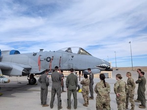 Cadets observe a jet at Nellis Air Force Base.