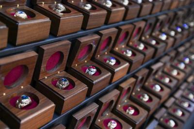 Cadet class rings sit in boxes awaiting the ceremony.