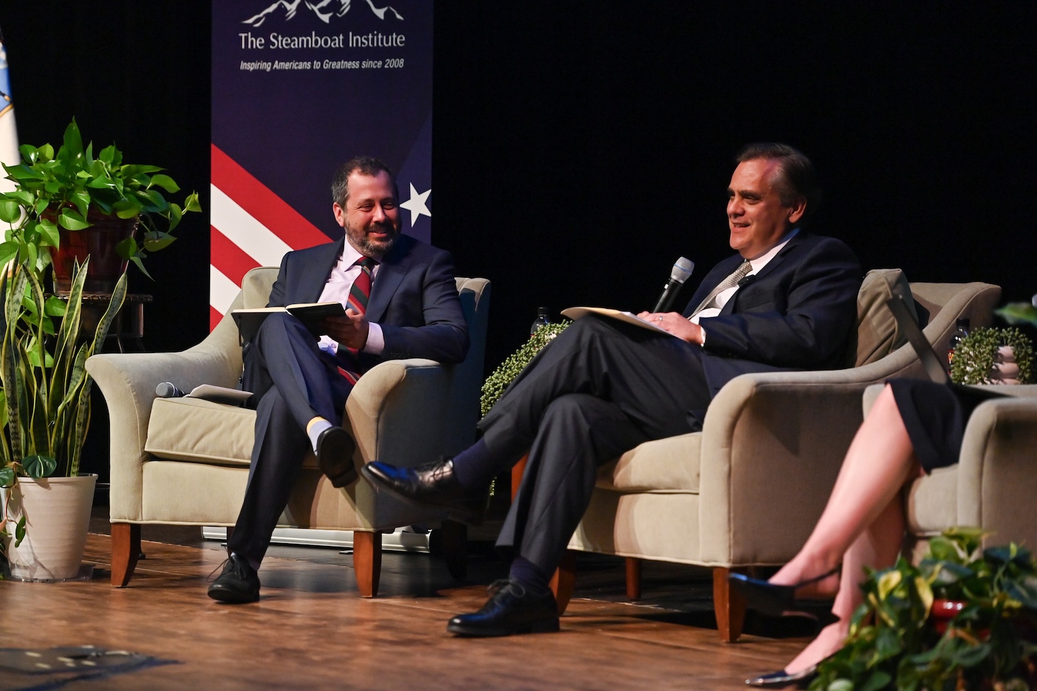 Daniel Farbman responds to a humorous remark from Jonathan Turley during the debate in Gillis Theater.