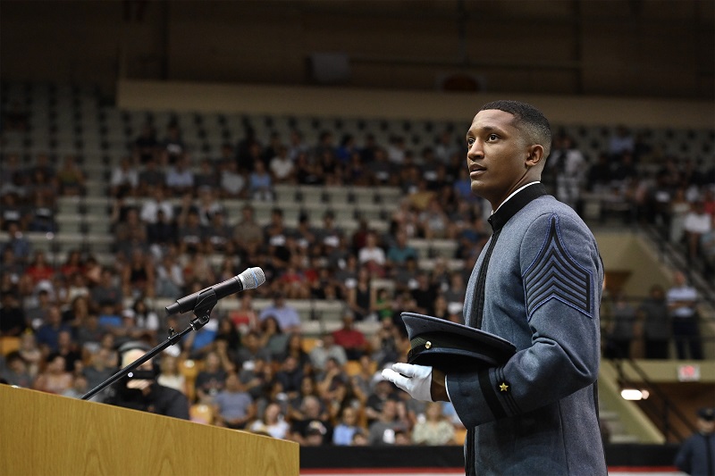 Regimental Commander Devin Auzenne ’26 addresses the crown in Cameron Hall during Matriculation.
