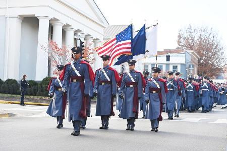 Members of the Corps of Cadets march down Main Street.