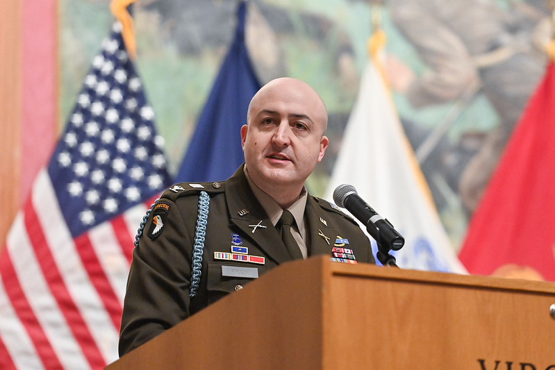 Col. Timothy Price ’04 speaks to commissioning cadets.